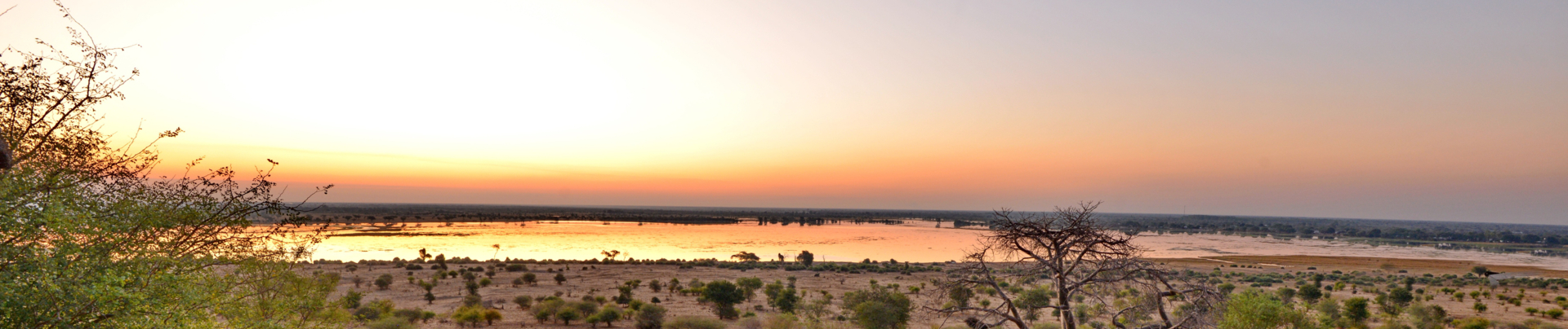 Machaba Chobe National Park Sunset Over Floodplain Machaba Chobe National Park Sunset Over Floodplain