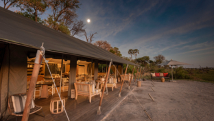 Machaba Safaris   Botswana Safaris   Gomoti Plains   Willdife Stories   September 2022   Banner   The Lodge At Dusk Machaba Safaris   Botswana Safaris   Gomoti Plains   Willdife Stories   September 2022   Banner   The Lodge At Dusk