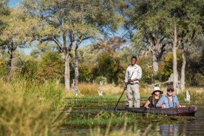 Machaba Web Experience Mokoro Guests Enjoying Canoe Machaba Web Experience Mokoro Guests Enjoying Canoe