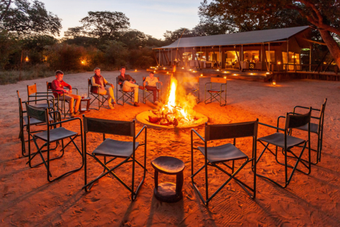 Machaba Web Packages Explorations Verneys Camp Sitting Around Fire Machaba Web Packages Explorations Verneys Camp Sitting Around Fire