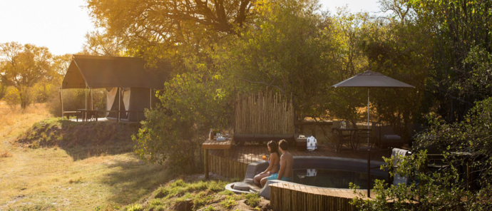 Machaba Safaris Botswana Little Machaba Sundowners In Pool Machaba Safaris Botswana Little Machaba Sundowners In Pool