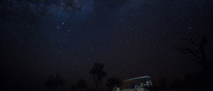 A night game drive under the Milk Way in teh Okavango Delta